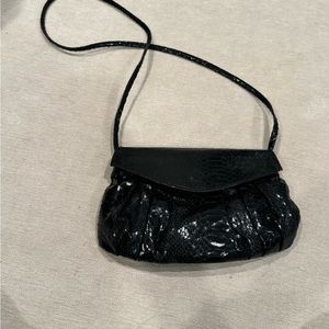 Carlos Flachi crossbody/clutch